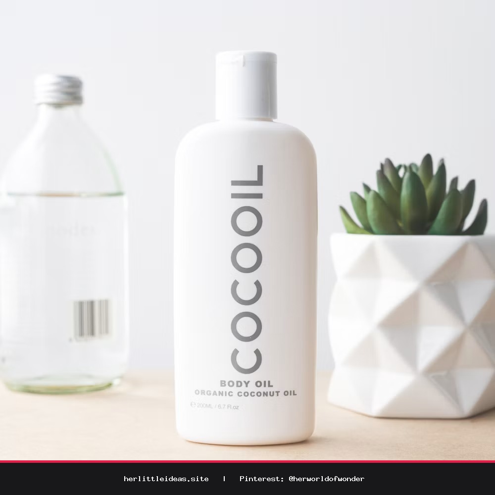 A minimalist skincare serum bottle next to flower petals on a textured surface.